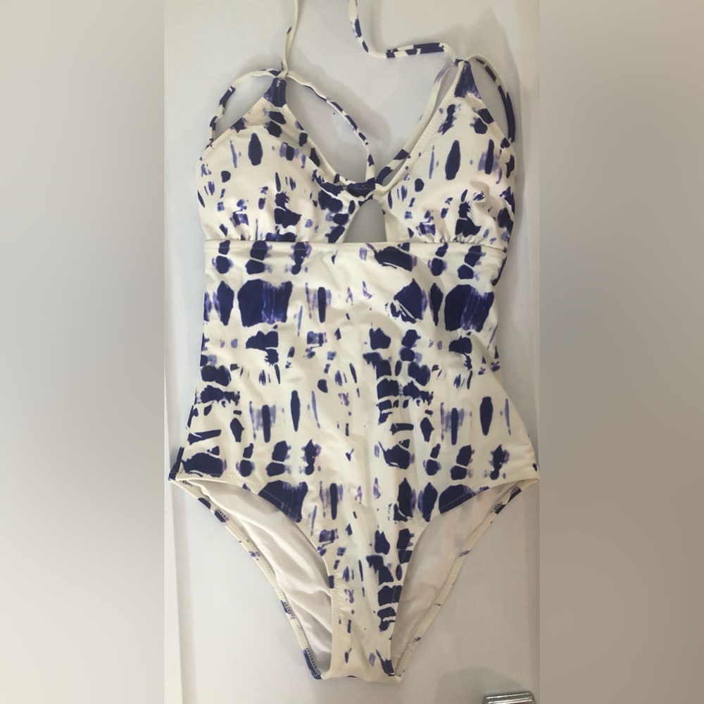 One piece swimsuit. Dark blue and white.